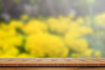 Fototapeta premium wood table top on blur background of blooming Verbena field on summer sunset - can be used for display or montage your products