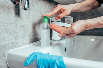 close up. casual man washes his hands thoroughly .
