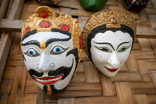 Malang, Indonesia (12-25-2020) - male and female malangan masks