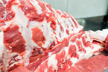 Fresh and raw meat. Whole piece of uncooked ribs and chops to grill