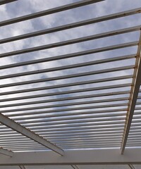 metal pergola that reveals the evening sky