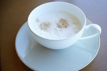 Cup of Cafe Latte isolated on white saucer - カフェラテ 