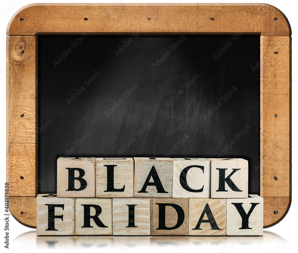 Poster text black friday made of wooden blocks in front of a blank blackboard with copy space. isolated on 