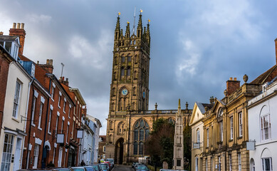 The view up a street in Warwick, UK towards the Cathedral on a bright winters day