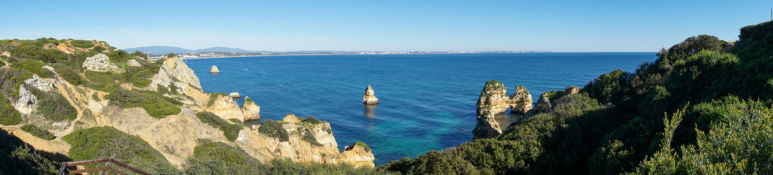 Panorama View Of Rugged Wild Coast In The Beautiful Algarve Region Of Portugal