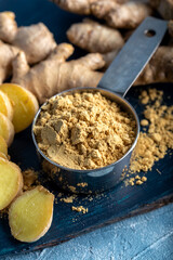 Fresh ginger root and ground ginger spice