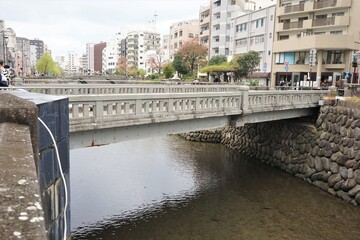 Fototapeta premium Historic Uoichi-bashi bridge in Nagasaki, Kyushu, Japan - 九州 長崎 魚市橋