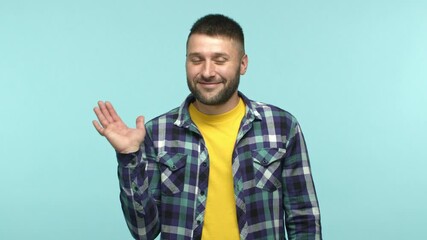 Handsome modest man make no big deal gesture, wave at camera as receive thanks and gratitude, smiling happy, being praised, standing over blue background