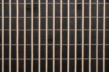 Black and yellow bamboo mat background 3:2 ratio