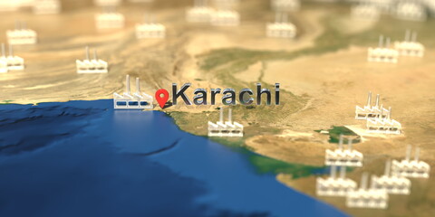 Fototapeta na wymiar Factory icons near Karachi city on the map, industrial production related 3D rendering