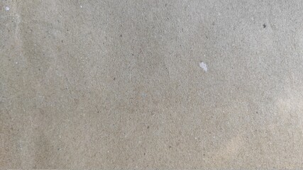 Texture of old brown paper with small specks