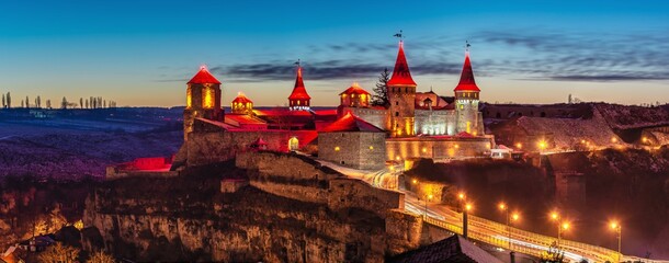 Kamianets-Podilskyi fortress on a winter night © Cavan