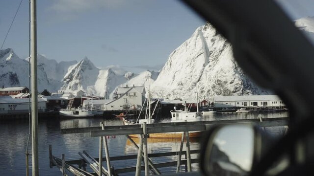 Yellow fish boat view in arctic landscape
