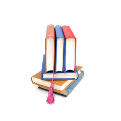 Stack of books in colour covers with white sheets isolated on a white background