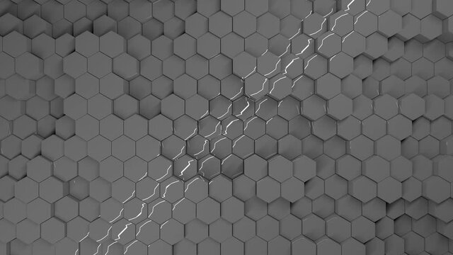 Reflection of light from water covering movable gray hexagons.