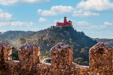 Pena Palace (Palácio da Pena) is a UNESCO World Heritage Site and one of the Seven Wonders of Portugal, part of the Sintra Cultural Site. View from the Castle of the Moors. Lisbon district, Portugal