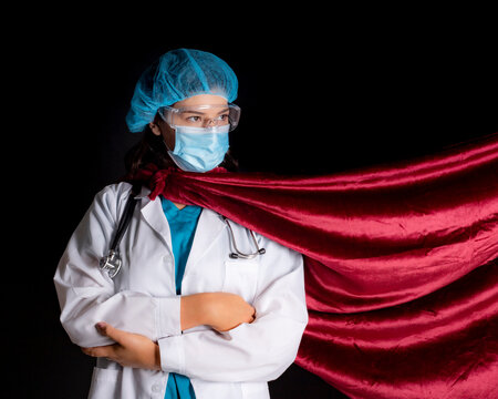 Female Doctor With Mask And Red Cape