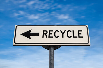Recycle road sign, arrow on blue sky background. One way blank road sign with copy space. Arrow on a pole pointing in one direction.