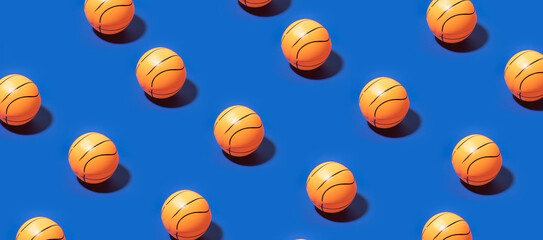 basketball ball on blue pattern background. concept, graphics, layout