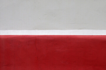 white and burgundy background with the texture of cement concrete in the form of a flag
