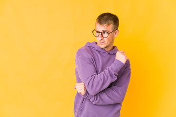 Fototapeta premium Young caucasian handsome man confused, feels doubtful and unsure.