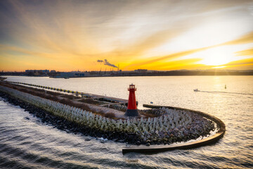 The lighthouse at the exit to the Baltic Sea in New Port at sunset, Gdansk. Poland © Patryk Kosmider
