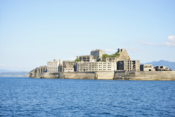 View of Gunkanjima or Battleship island, Ghost Island, from ferry boat in Nagasaki, Japan - 長崎...
