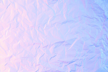 White crumpled paper texture background in neon light