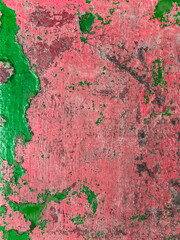 Grungy background with red and green peeling paint