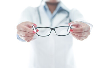 Optometrist holding a pair of glasses