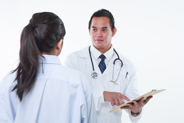 Fototapeta premium Doctors reviewing and discussing the results