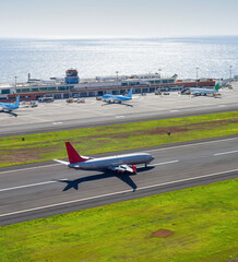 Airplane taking off Madeira airport