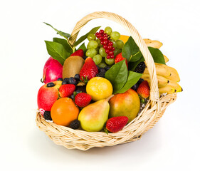 Fruit and berries in a yellow basket