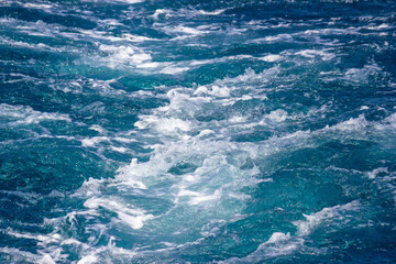 Fototapeta na wymiar Sea wave and boat motor foaming view