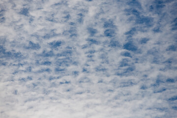 Fototapeta na wymiar blue sky where white clouds glide in the wind