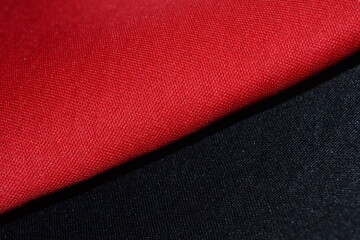 close-up view of red and black neoprene fabrics