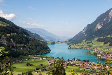 Fototapeta na wymiar Summertime view over Lake Lungern in Obwalden Canton in Central Switzerland