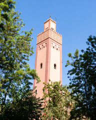 Fototapeta na wymiar Minaret of a Mosque Of Turkey at Marrakesh, Morocco against blue sky background