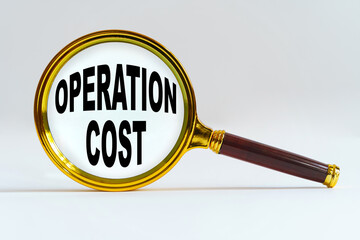 Magnifier on a white background, inside the text is written - OPERATION COST