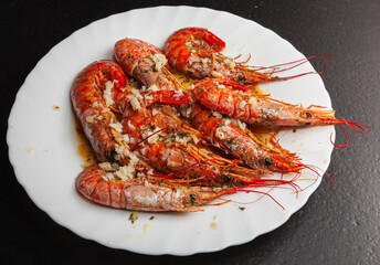 Grilled shrimp served on a plate