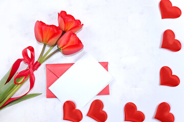Concept for Valentine's Day or Women's Day. Postcard, hearts, flowers and gift boxes on a pink background, place for text, banner, Happy holidays, congratulations, birthday,