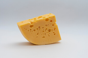 A semicircular piece of hard cheese