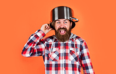 too much work. man holding frying pan.. male chef kitchener cooking. hipster checkered shirt for...