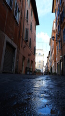 View of old cozy street in Rome, Italy. Architecture and landmark of Rome. Postcard of Rome.