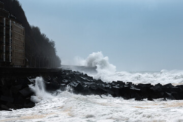 Waves breaking on the New Promenade of San Sebastian during the storm Bella, Spain