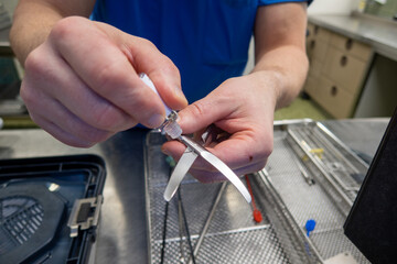 in the sterilization department of a hospital, the joints of surgical instruments are oiled