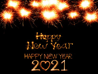 Sparkler text Happy New Year 2021 in Dark Black Background