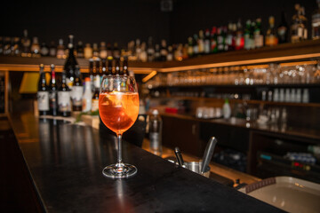 Fototapeta na wymiar Italian cocktail drink on bar counter in a pub or restaurant