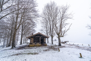Beautiful refuge of the aizkorri mountain in gipuzkoa. Snowy landscape by winter snows. Basque Country, Spain