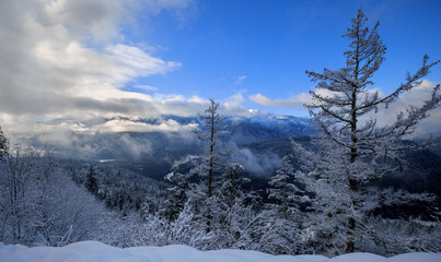 Stunning winter valley view from mountain road